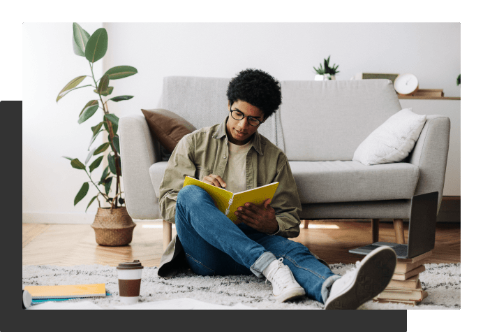 Student studying with a book